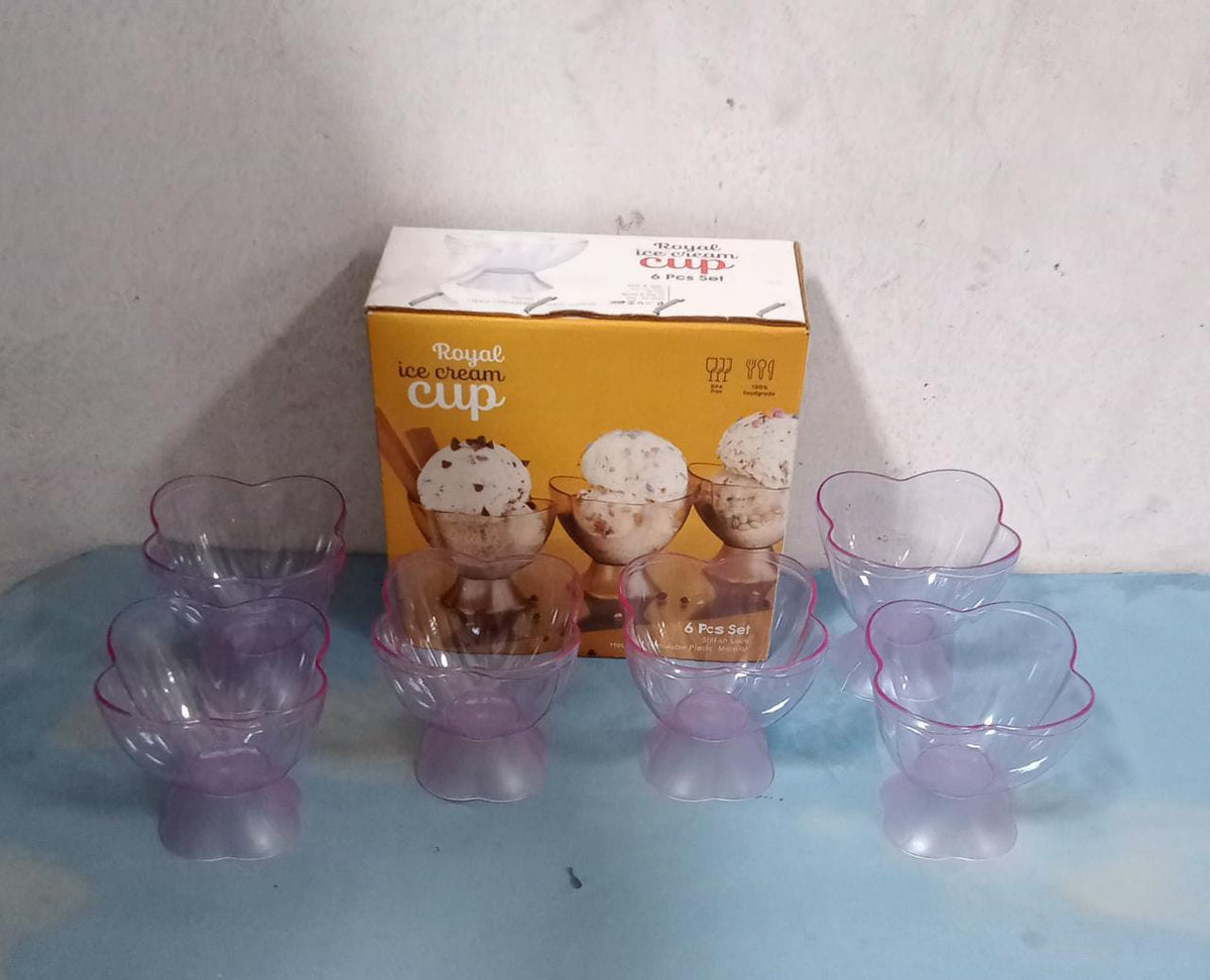 Eight clear and purple plastic ice cream bowls arranged in front of a 'Royal Ice Cream Cup' box.