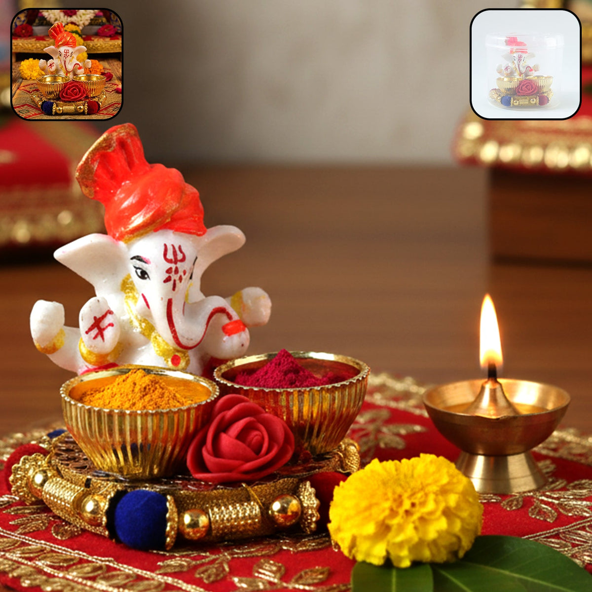 A white Ganesha idol with an orange turban sits on a gold base with two bowls filled with yellow and red powder, next to a