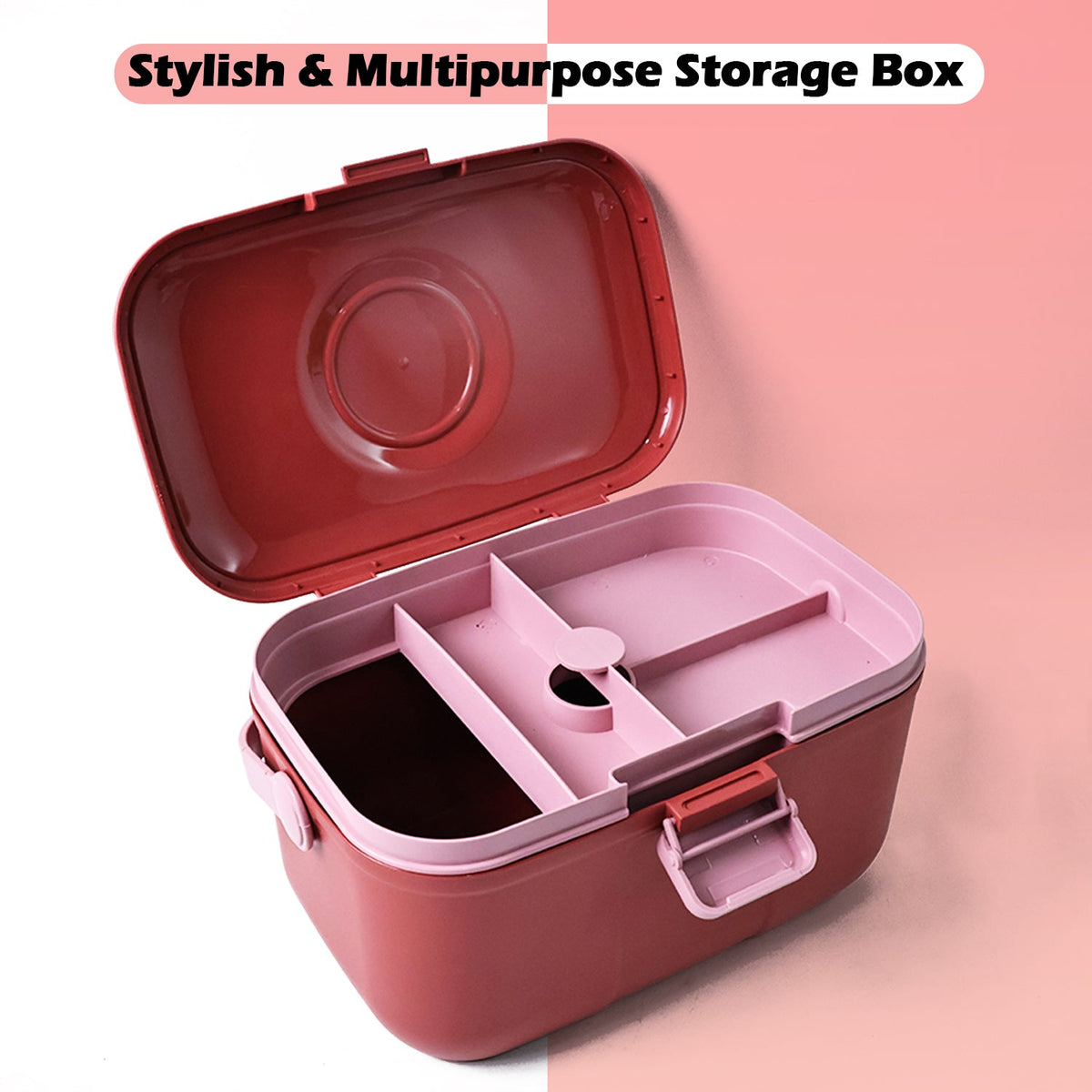 Open red and pink plastic storage box with internal compartments, against a split pink and grey background.