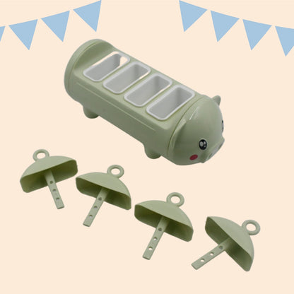 Pig-shaped ice candy mold with four cups for making sicles.