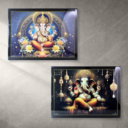 Two framed Lord Ganesha paintings, one with a starry blue background and another with dark, ornate hanging lanterns.