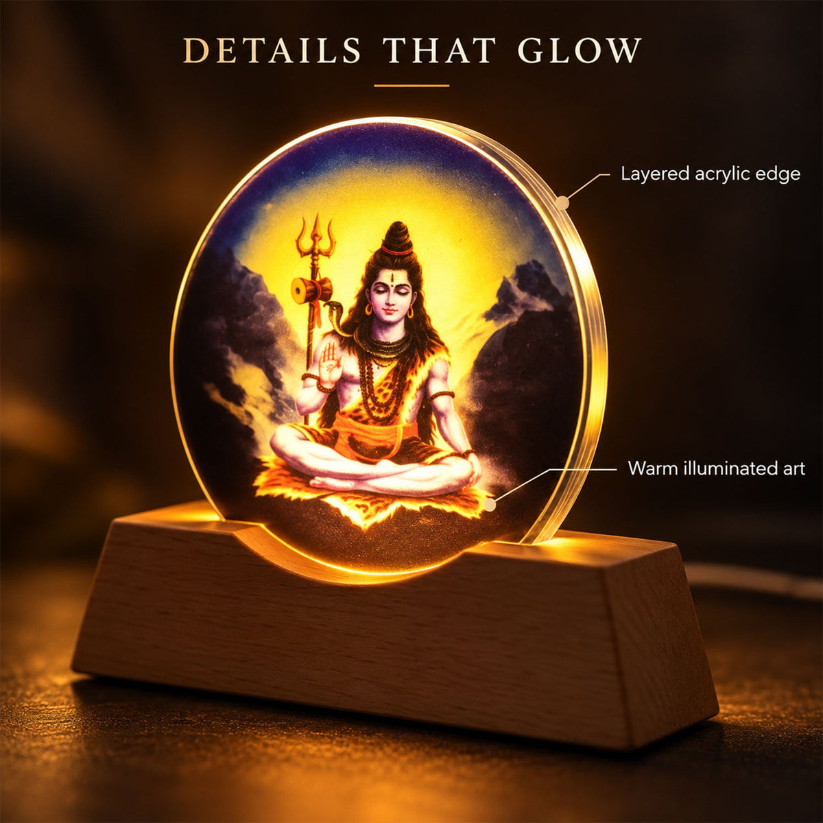 Close-up of the glowing Shiva acrylic panel highlighting its layered edge and warm illuminated artwork on a dark surface.