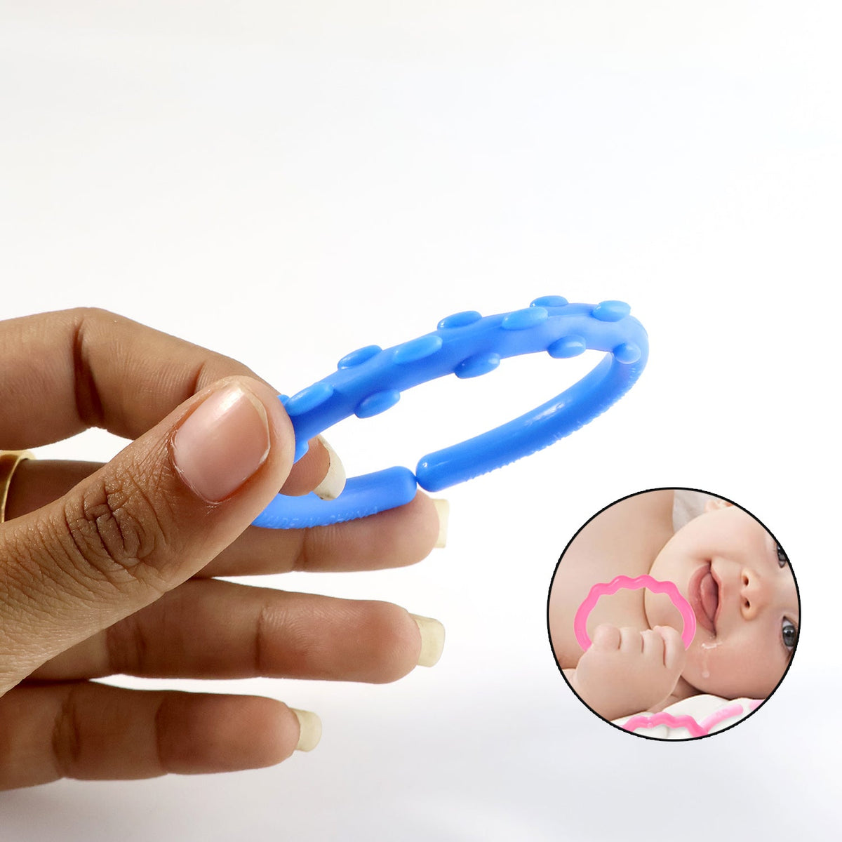 A hand holds a blue textured learning link, with an inset of a baby holding a pink link to its mouth.