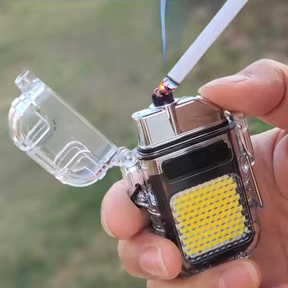 A hand holds the clear waterproof electric lighter and flashlight, igniting a cigarette with its electric arc.