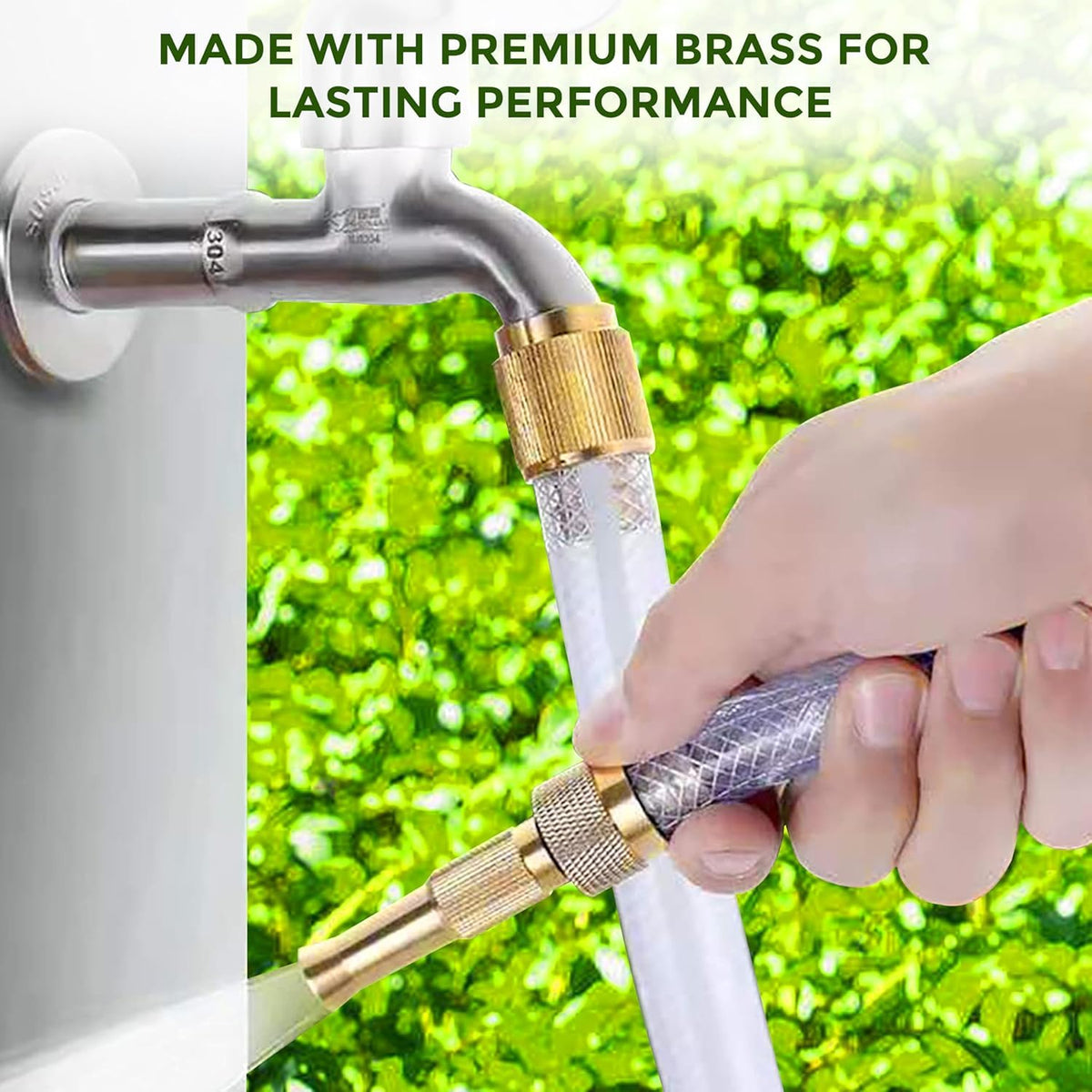 A hand connects a clear hose with a brass fitting to a silver outdoor faucet against a bright green, leafy background.