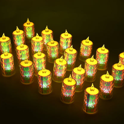 Twenty-four lit LED tea lights with colorful, shimmering bases and bright yellow tops in a dark room.