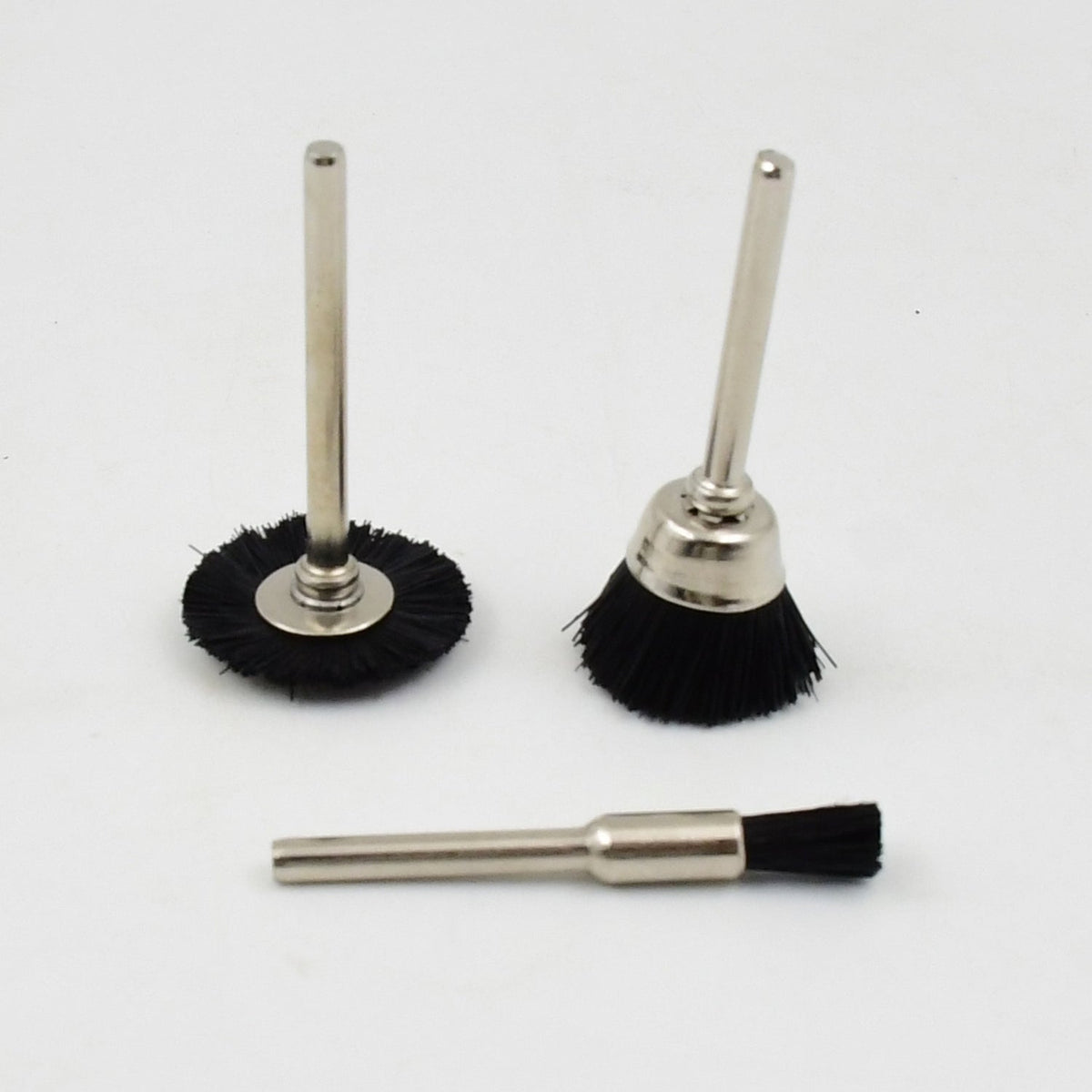 Three black nylon brushes with silver shafts are neatly arranged on a plain white background.