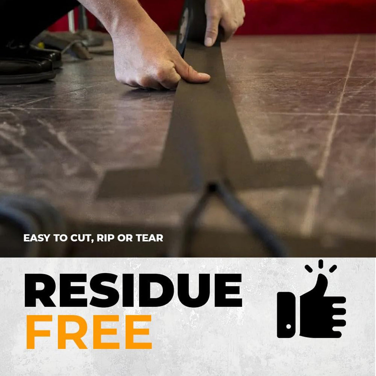 Hands applying wide black tape to a floor, with text indicating it's residue-free.