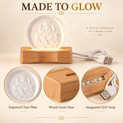 Ganesha LED lamp components: engraved clear plate, wood-grain base, and integrated LED strip with USB cable.