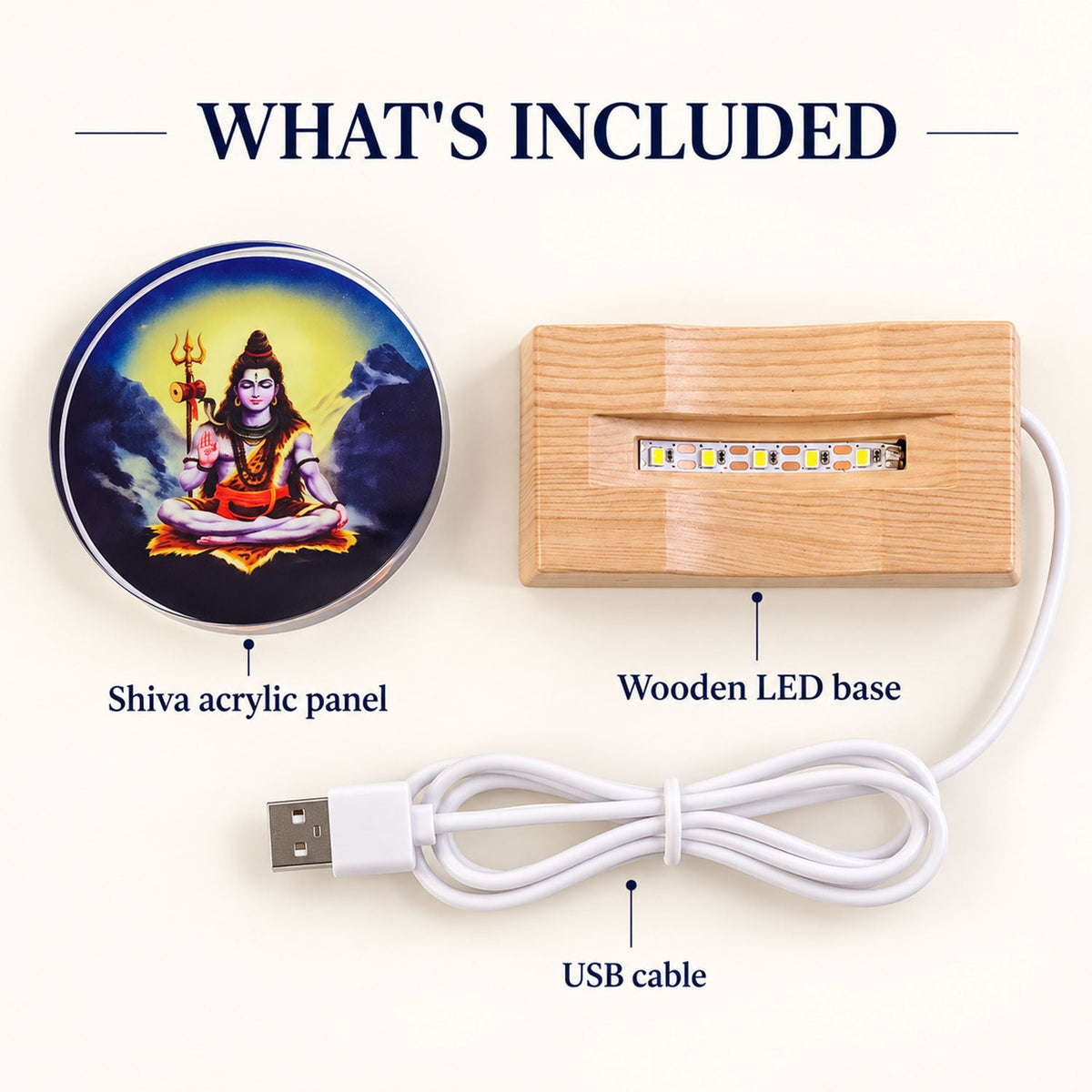Disassembled components: a Shiva acrylic panel, a wooden LED base, and a coiled white USB cable on a light background.
