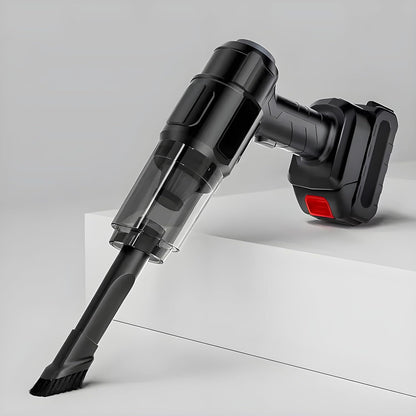 Black handheld vacuum cleaner with a brush attachment, angled downwards on a white stepped surface.