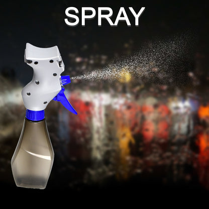 A gray and blue spray bottle with a fine mist spraying from the nozzle against a dark, blurred background.