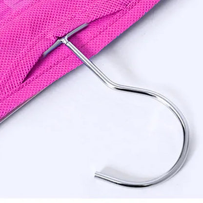 Close-up of the silver metal hook attached to the top of the pink fabric organizer.