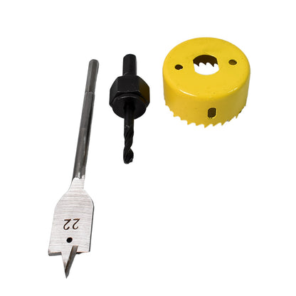 A yellow hole saw, a black drill bit, and a silver spade bit are neatly arranged on a white background.