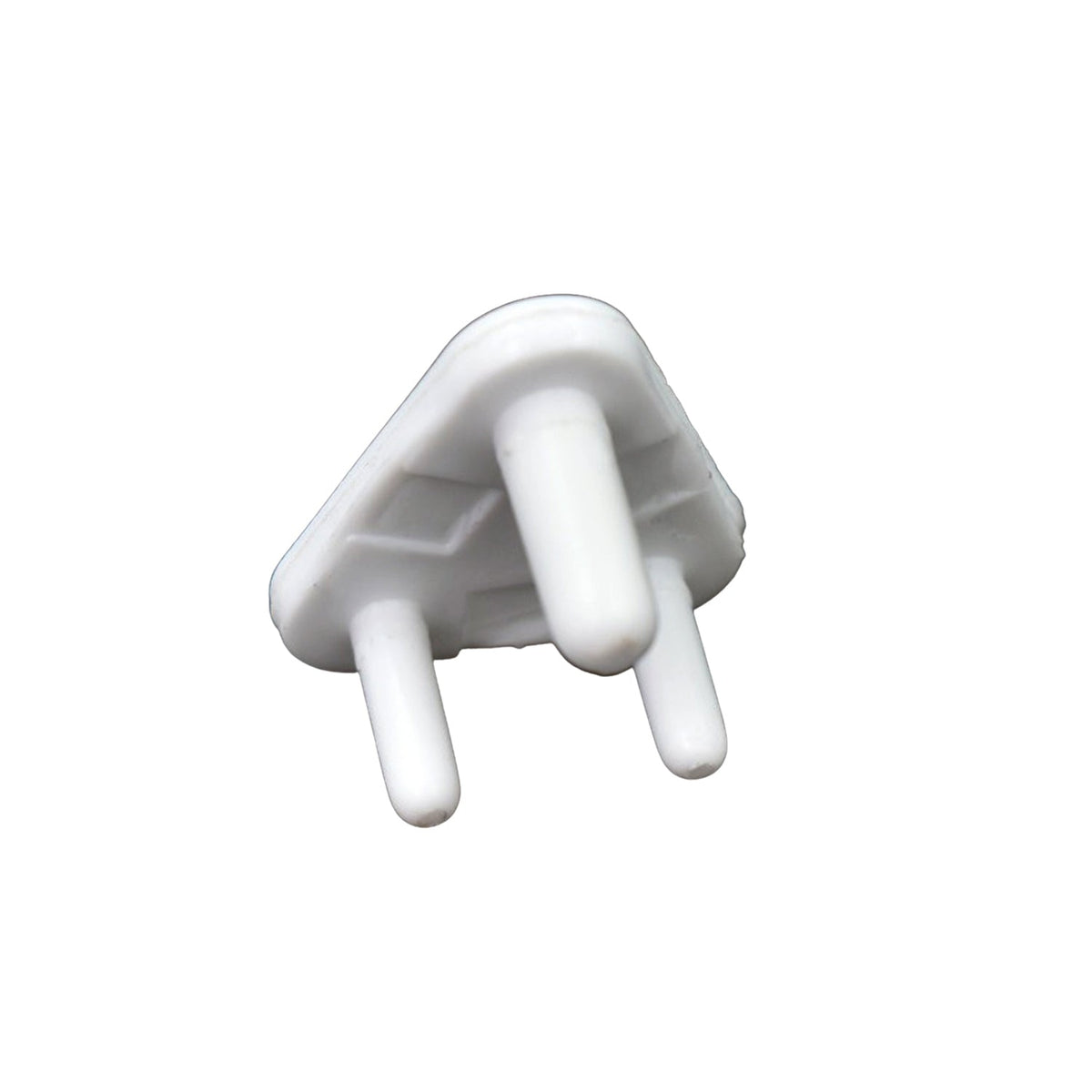 A single white plastic child safety socket cover, triangular with three prongs, viewed from an angle on a white background.