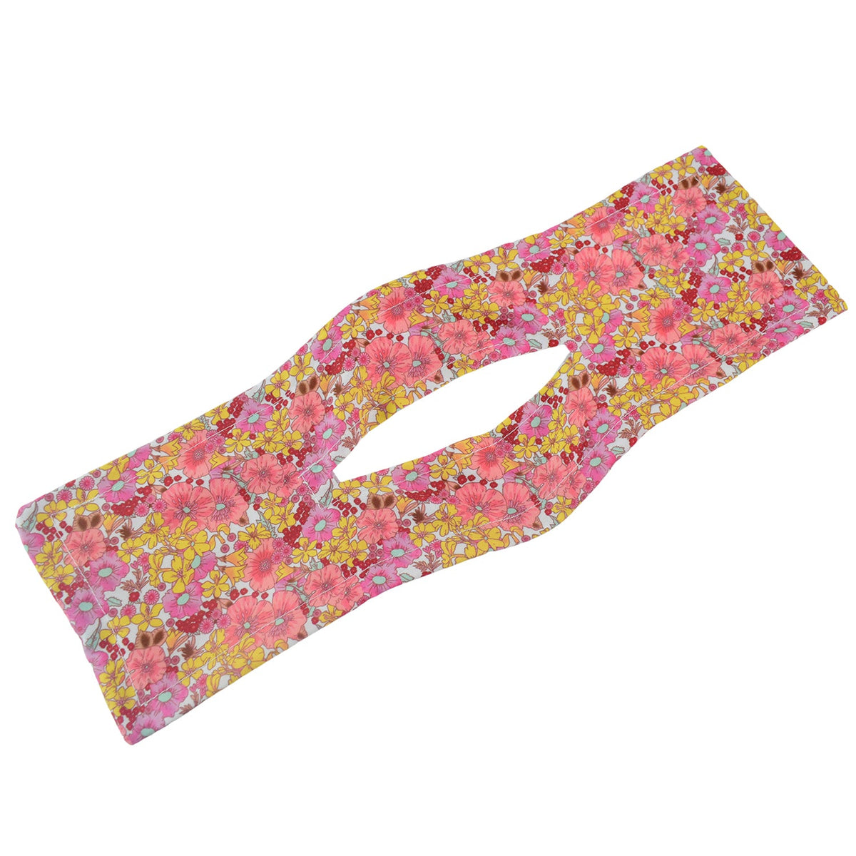 Pink and yellow floral hair bun maker with an elongated oval cutout in the center.