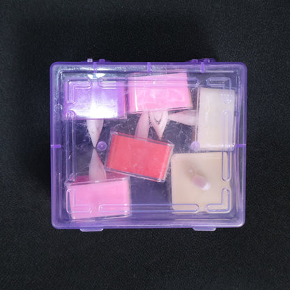 A clear purple plastic box containing six square LED flameless tealight candles in various colors.