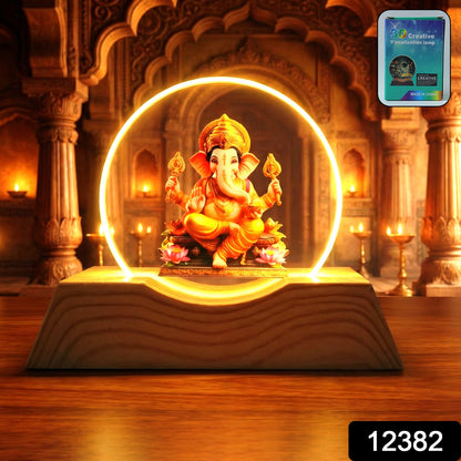 Lord Ganesha LED lamp with a golden glow in a temple setting, with a product label overlay.