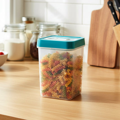 Clear plastic food storage container with teal lid filled with colorful pasta on a kitchen counter.