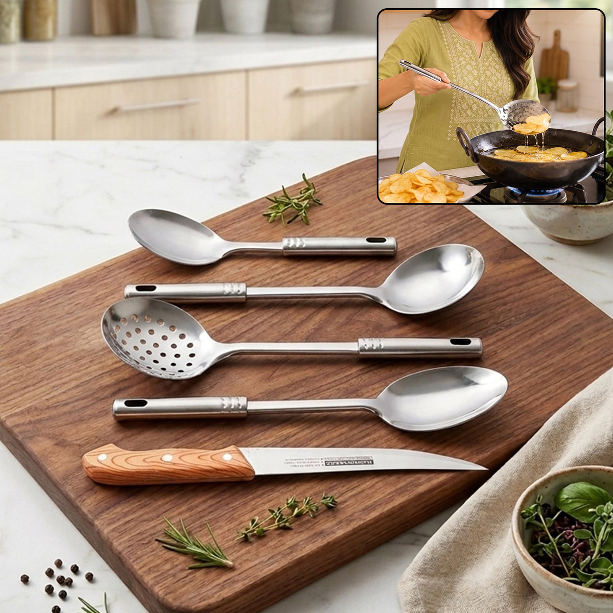 A stainless steel slotted spoon, two solid spoons, a ladle, and a knife with a wooden handle on a cutting board.
