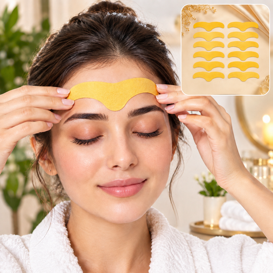 A woman in a white robe applies a gold forehead patch, with a small inset showing ten patches.