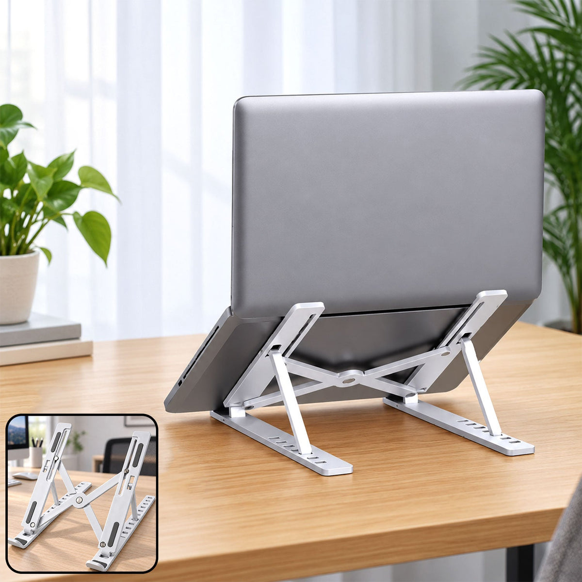 White foldable laptop stand with dark gray accents, shown from an elevated perspective.
