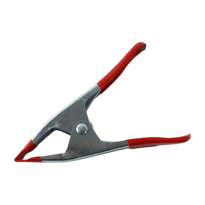 Metal spring clamp white background