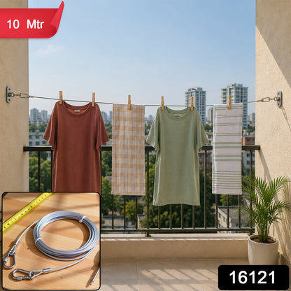 A clothesline with two shirts and two towels drying on a balcony with city buildings in the background. Inset shows – view 2