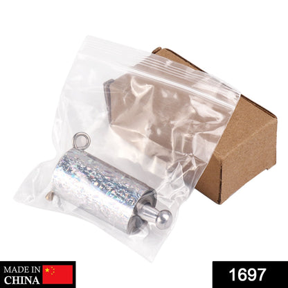 A silver collapsible magic cane in a clear plastic bag, next to a small brown cardboard box.