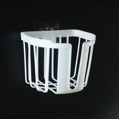 A white plastic toilet paper holder with vertical slats and a clear adhesive hook is shown against a dark background.