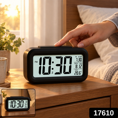 A black digital alarm clock displaying 10:30 PM, 7:30 alarm, date 8.12, and 20.6°C temperature, on a bedside table – view 2