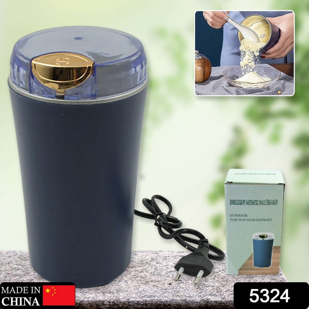 Hand holding the compact portable electric coffee and spice grinder for scale.