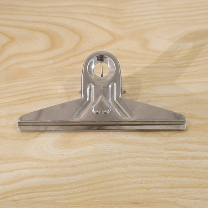 Live photo of metal bulldog binder clip