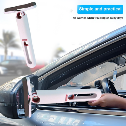 A person uses the white and red silicone squeegee to clean a car's side mirror, with another squeegee in the background.