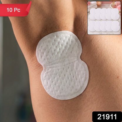A white sweat pad on a person's armpit, with a red "10 Pc" banner and a black "21911" label.