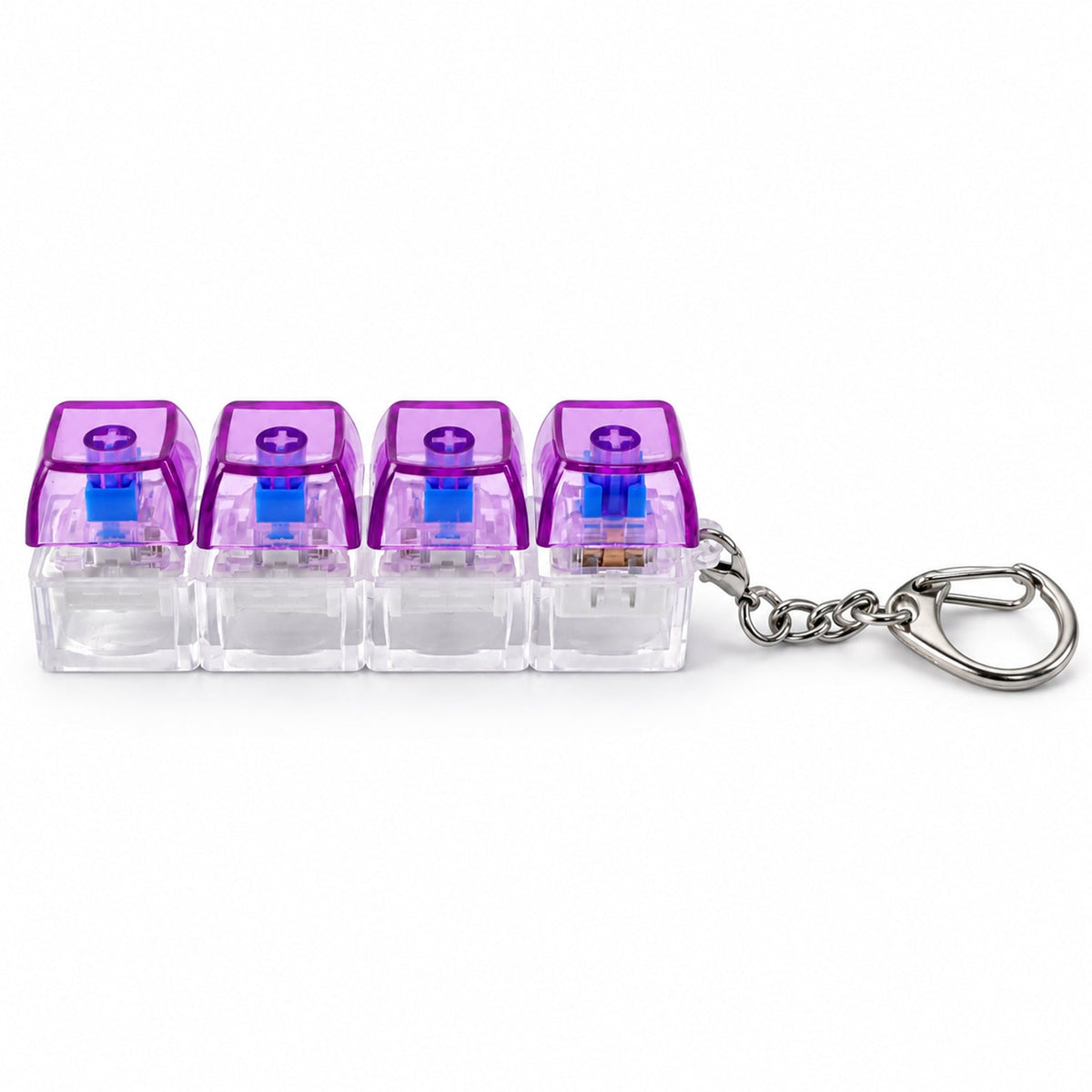 A four-key keyboard switch keychain with purple caps, clear bases, and a metal clasp on a white background.