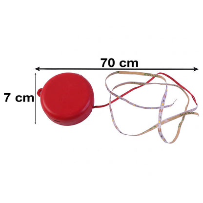 A red battery pack and LED strip light with dimensions of 7 cm for the pack and 70 cm for the strip shown on white.