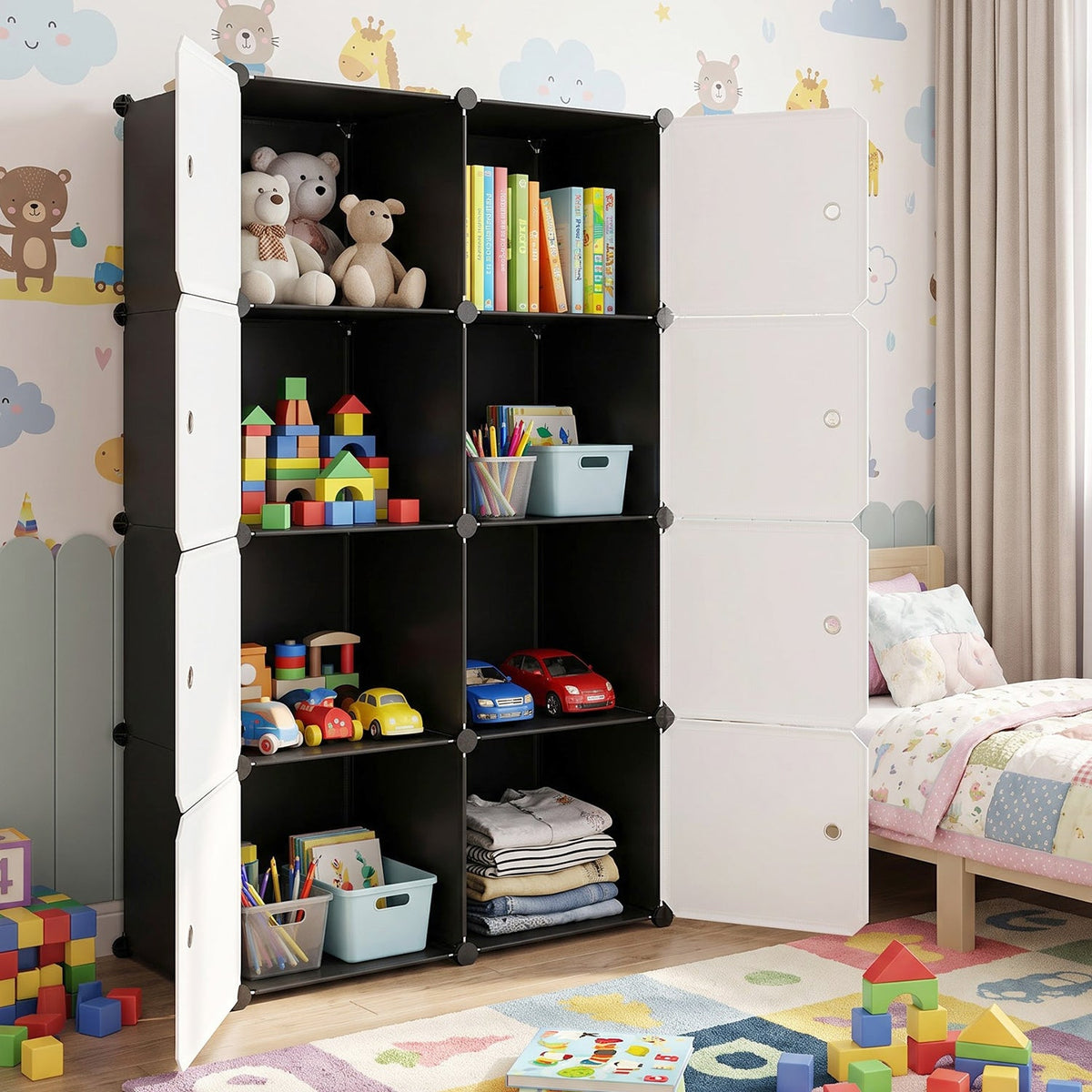 Black and white modular storage cabinet with open compartments filled with toys and books in a child's room.