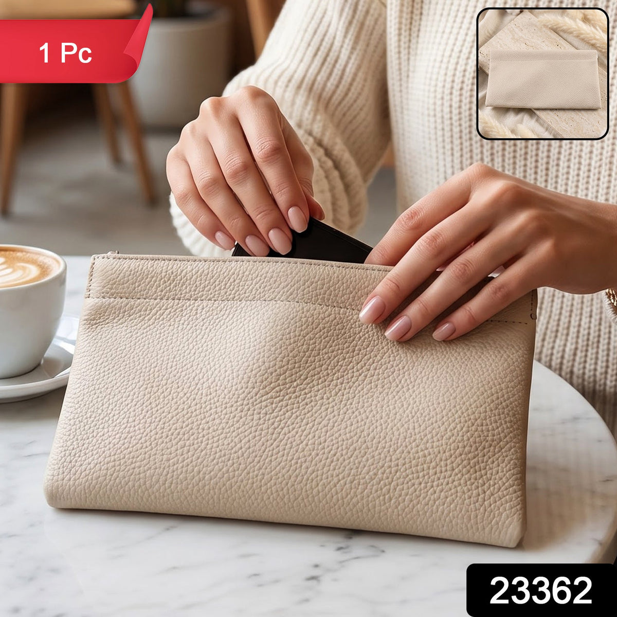 A cream textured faux leather pouch on a marble cafe table, with a coffee cup beside it, and a woman's hands putting a black