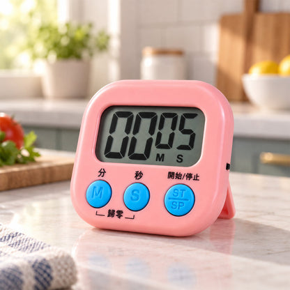 Close up of digital kitchen timer buttons M S Start Stop