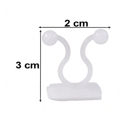 A single white plastic self-adhesive plant clip is shown with measurements of 2 cm width and 3 cm height.
