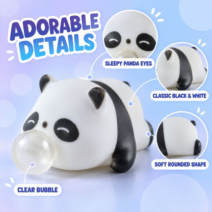 A close-up of the panda squishy toy highlights its sleepy eyes, black and white color, soft shape, and clear bubble.