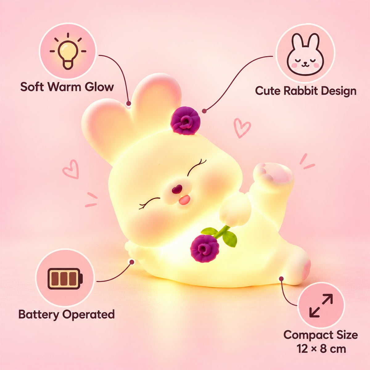 Detailed view of the reclining rabbit night light with floral accents