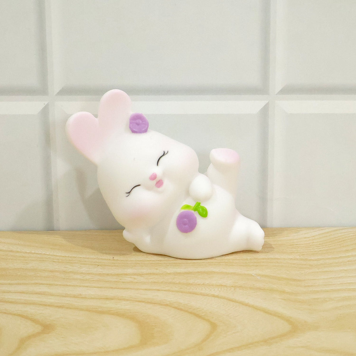 Reclining rabbit night light used as room decor
