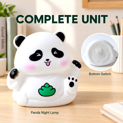 A white panda night lamp with a green leaf design, showing its bottom switch detail.