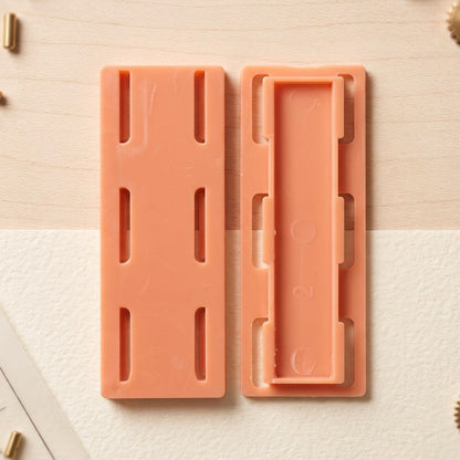 Sliding insert plate retainer clip front and back view
