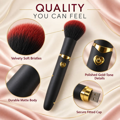 A black makeup brush with red and black bristles and gold details stands upright against a plain white background.