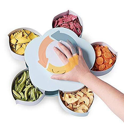A teal and gray petal-shaped storage box is shown closed, with a dark gray rotating lid featuring a star design.