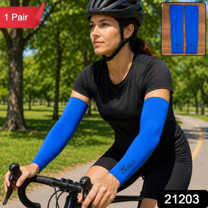 Woman cycling outdoors wearing a black helmet, black shirt, and blue arm sleeves with a logo, with a '1 Pair' label.