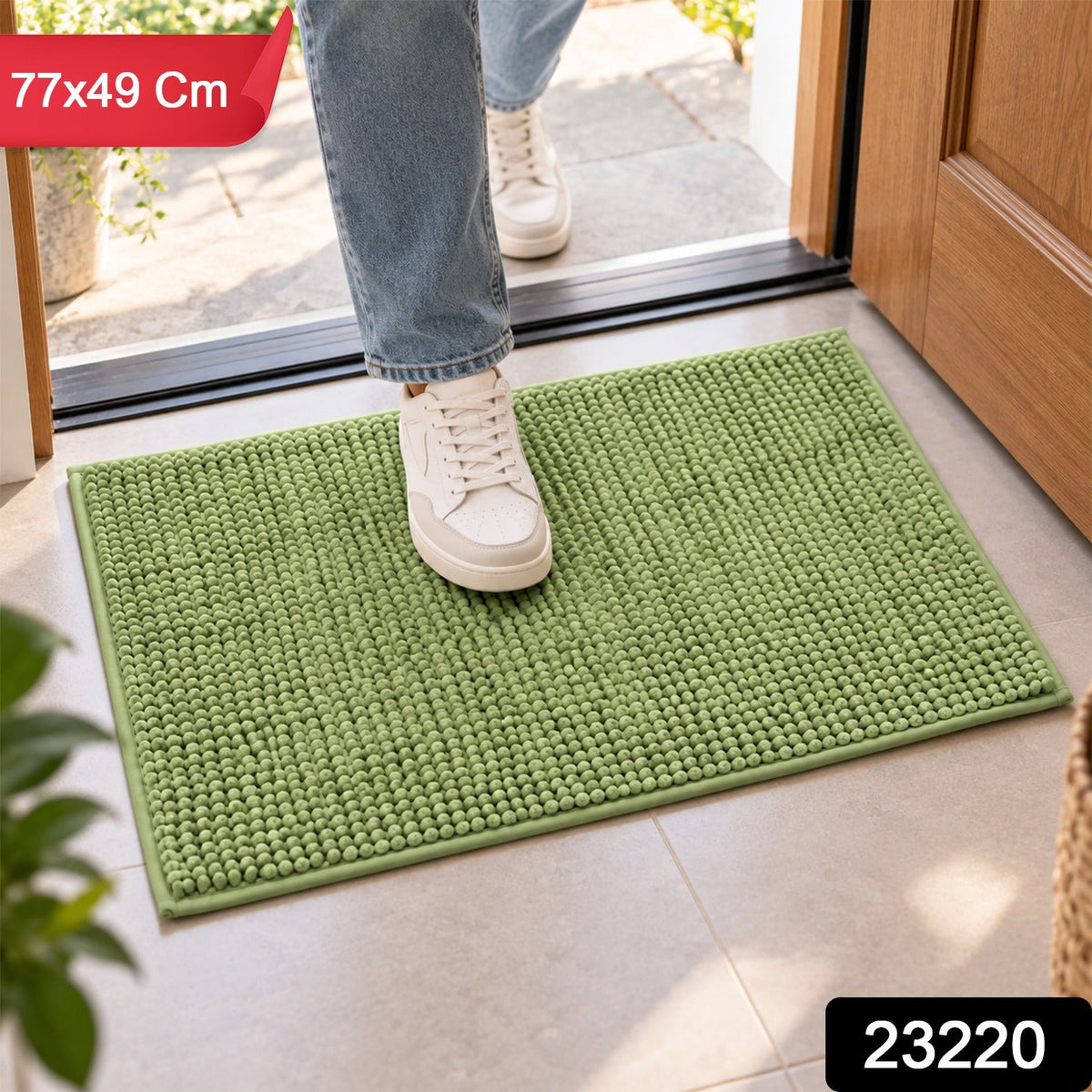 A person's feet in white sneakers stepping onto a green bobble mat, with product dimensions and code overlaid.